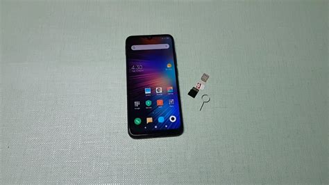 How to Insert SIM & MicroSD Card Into Redmi Note 7 & Redmi .
